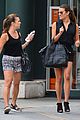 lea michele flashes her lacy white bra while shopping with her mom 05