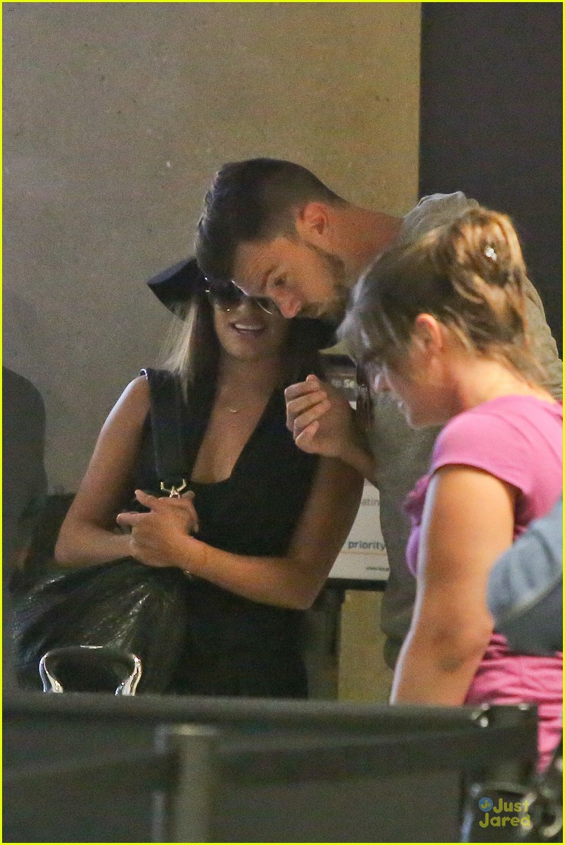 lea michele matthew paetz hold hands at lax 04