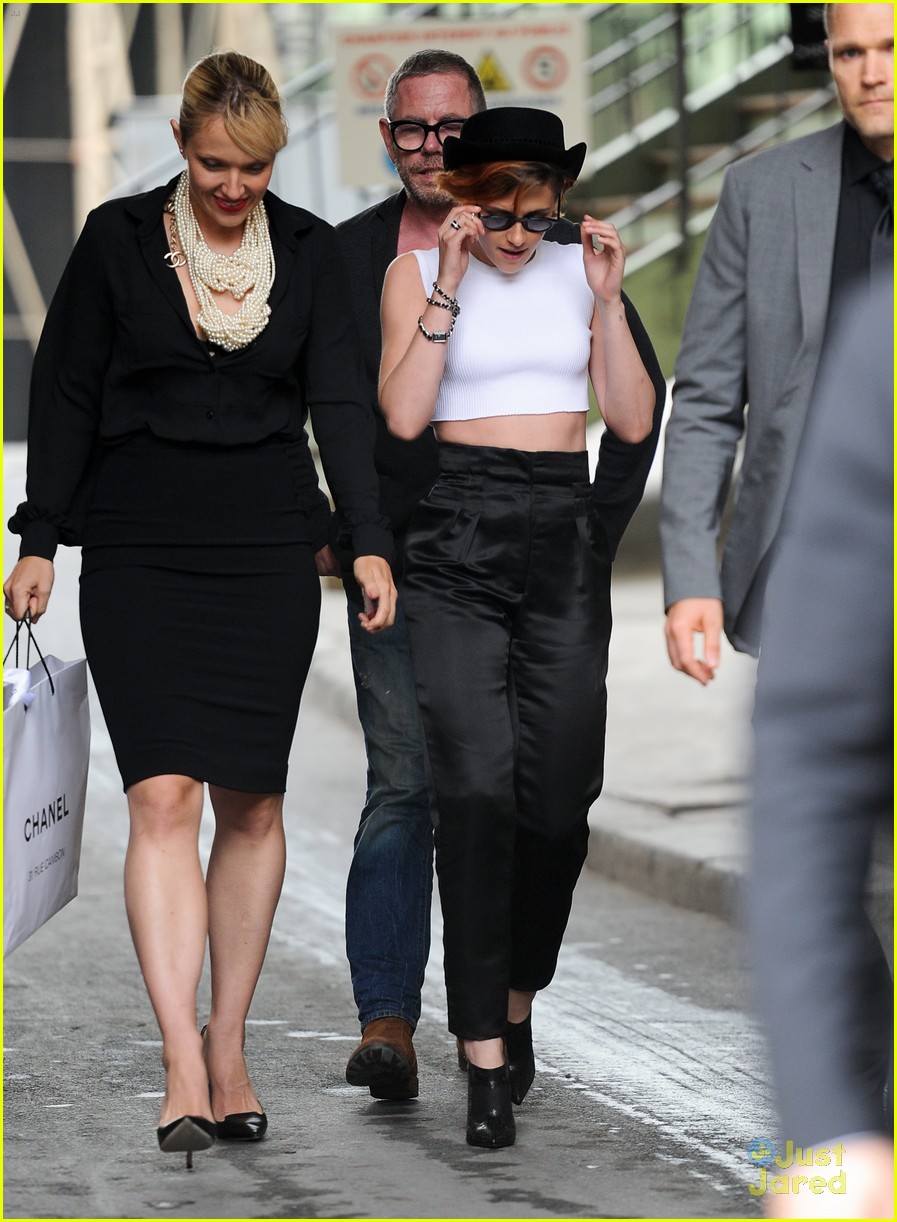 kristen stewart covers up her new short hair with a hat 03