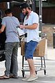 liam hemsworth eats chips grocery shopping 01