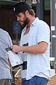 liam hemsworth eats chips grocery shopping 04