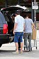 liam hemsworth eats chips grocery shopping 07