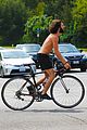 mateo arias shirtless bike ride beard long hair 04