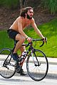 mateo arias shirtless bike ride beard long hair 05
