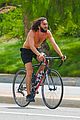 mateo arias shirtless bike ride beard long hair 07
