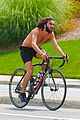 mateo arias shirtless bike ride beard long hair 08