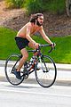 mateo arias shirtless bike ride beard long hair 10