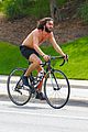 mateo arias shirtless bike ride beard long hair 11