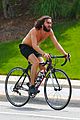 mateo arias shirtless bike ride beard long hair 13