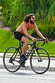 mateo arias shirtless bike ride beard long hair 14