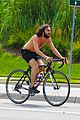mateo arias shirtless bike ride beard long hair 15