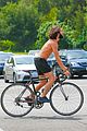 mateo arias shirtless bike ride beard long hair 17