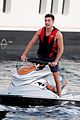 zac efron goes shirtless for jet ski fun with michelle rodriguez 06
