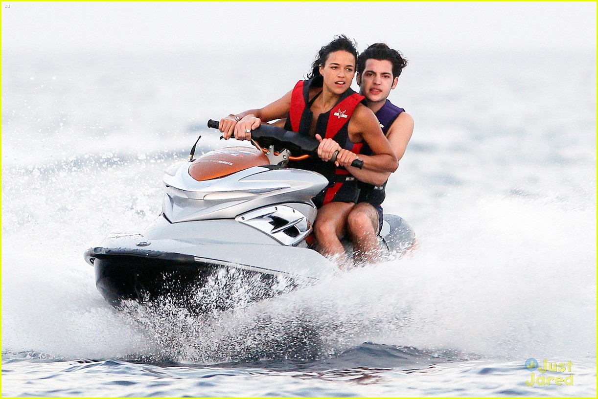 zac efron goes shirtless for jet ski fun with michelle rodriguez 03