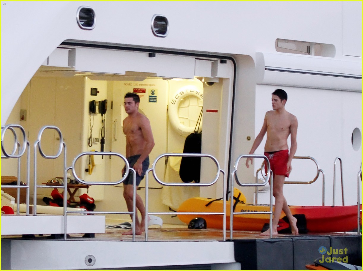 zac efron goes shirtless for jet ski fun with michelle rodriguez 05