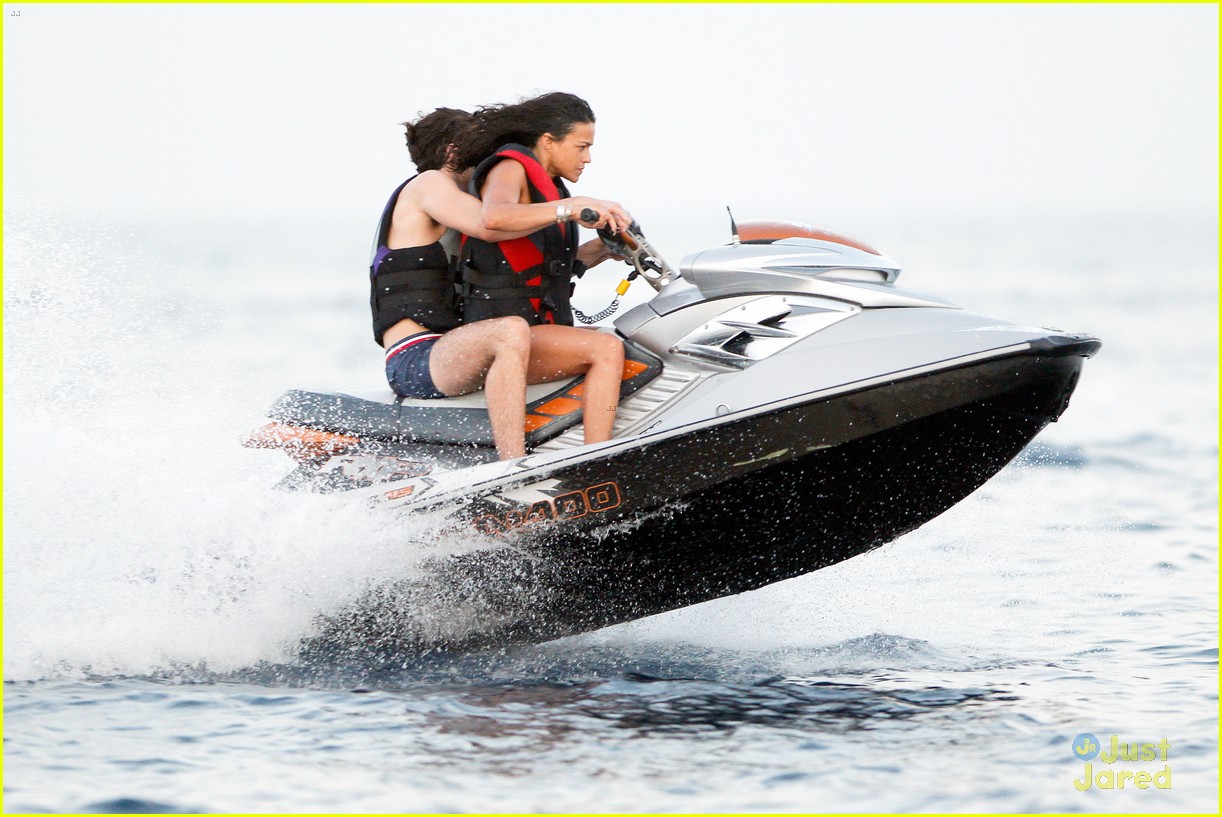 zac efron goes shirtless for jet ski fun with michelle rodriguez 08