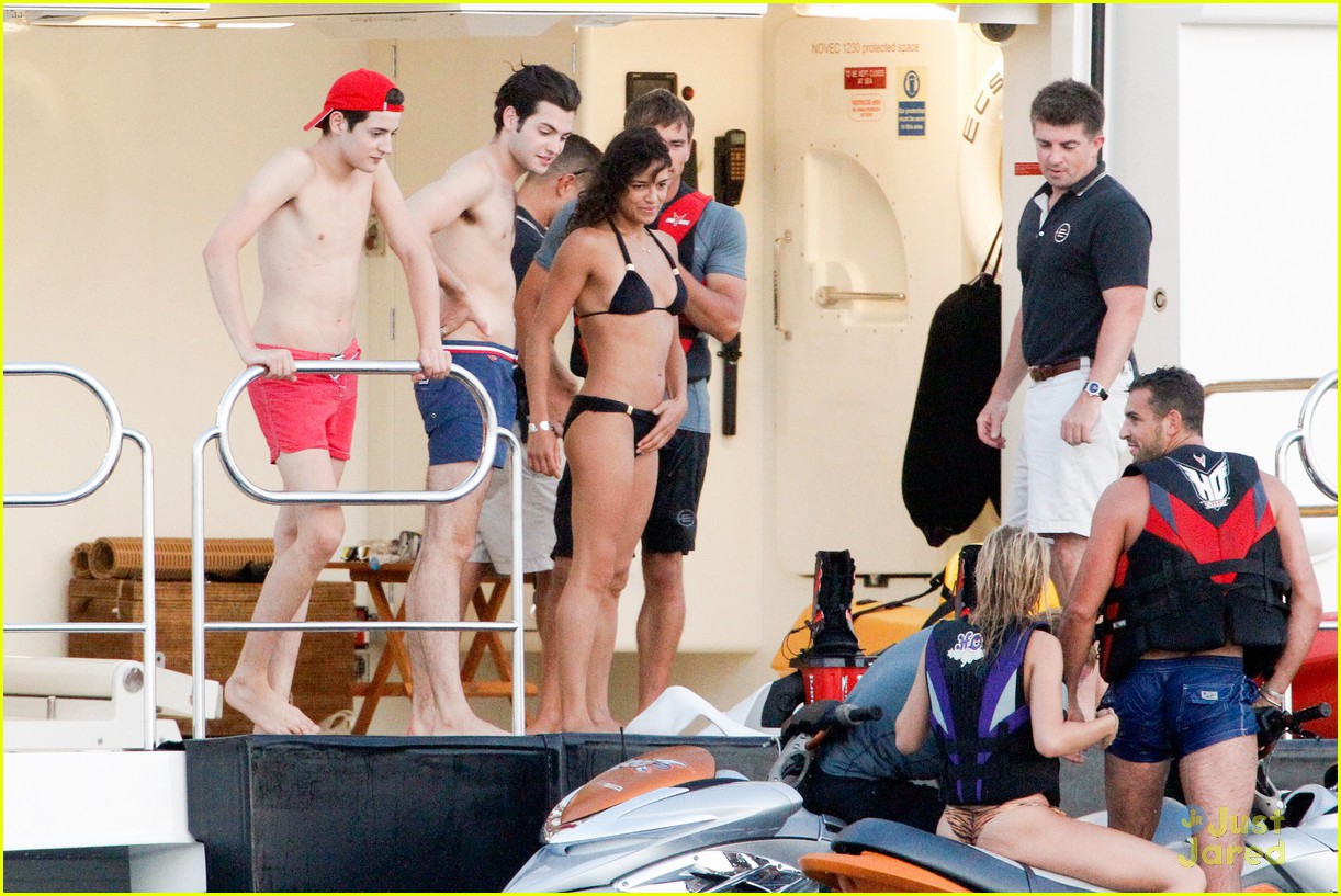 zac efron goes shirtless for jet ski fun with michelle rodriguez 19