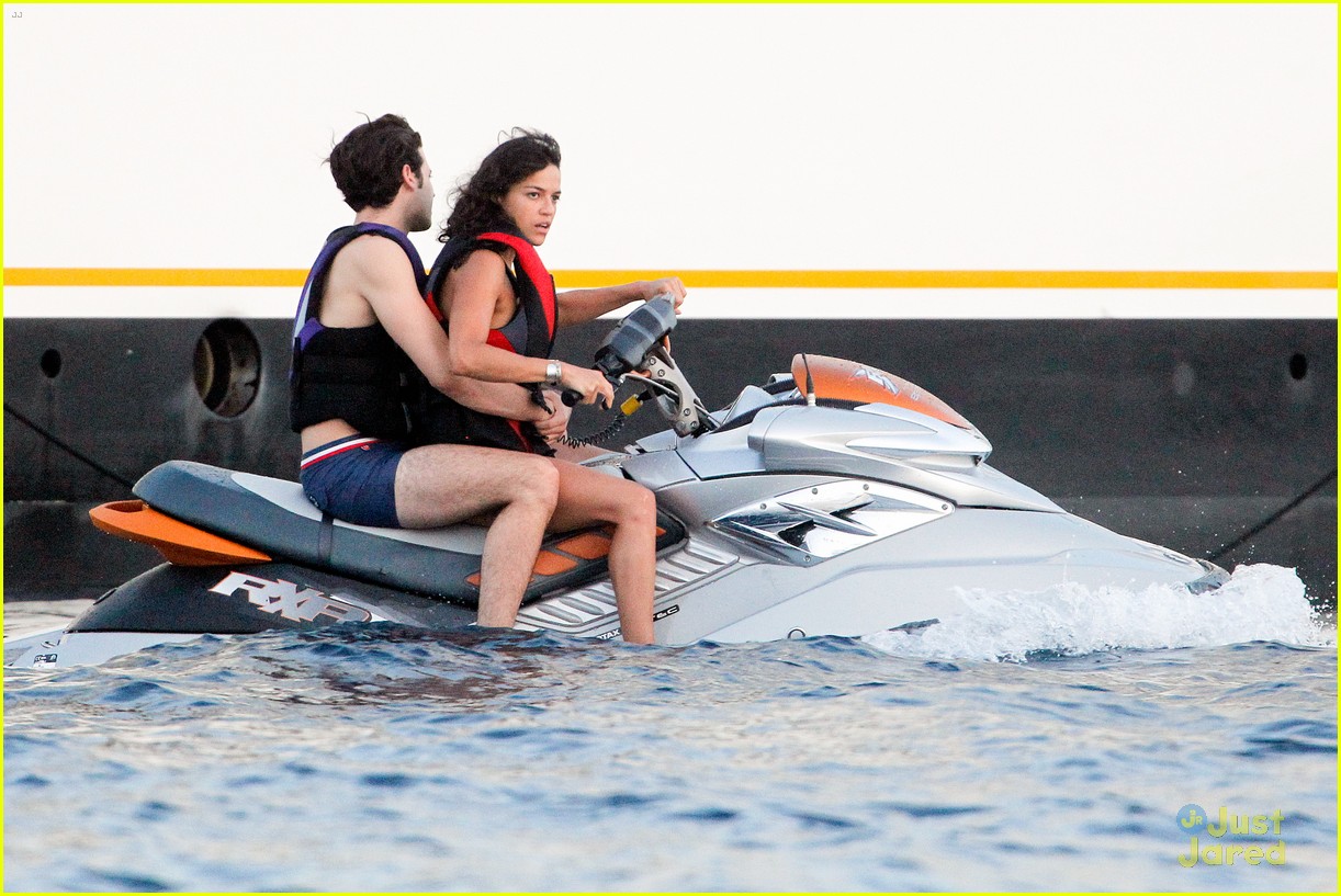 zac efron goes shirtless for jet ski fun with michelle rodriguez 24