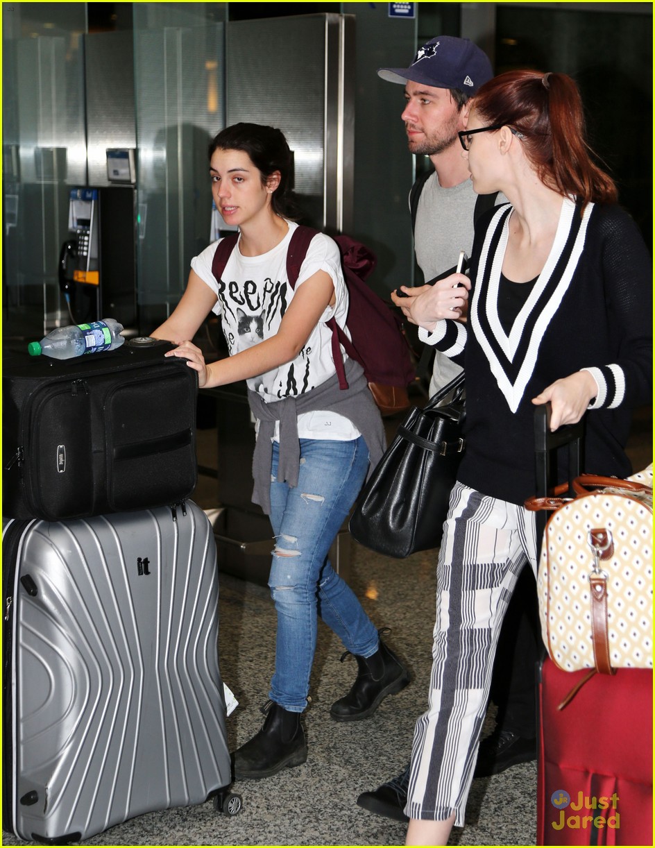 adelaide kane torrance coombs hug it out toronto airport 09