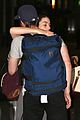 adelaide kane torrance coombs hug it out toronto airport 04