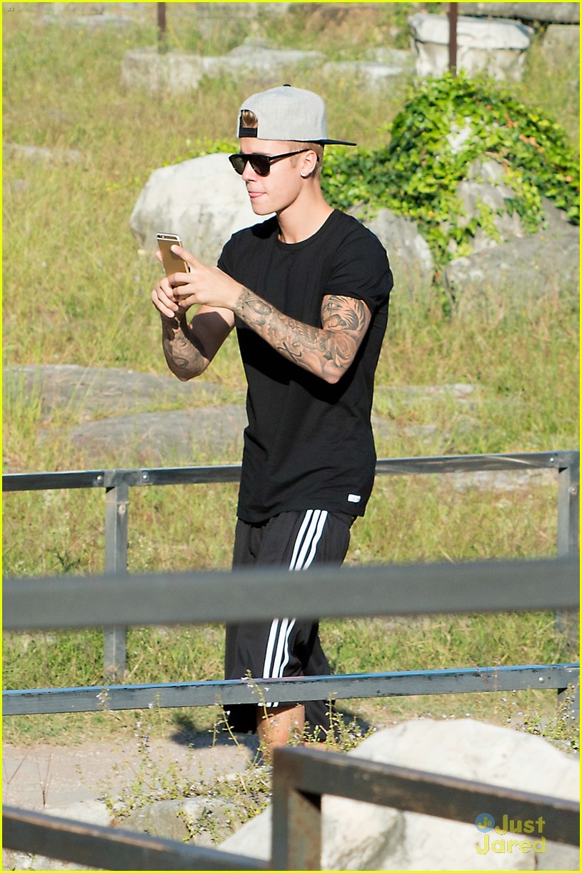 justin bieber cant help taking pics of rome 32