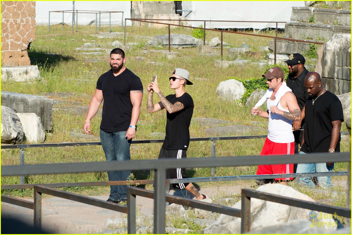justin bieber cant help taking pics of rome 35