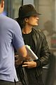 orlando bloom selena gomez walks steps apart from each other at the airport 02
