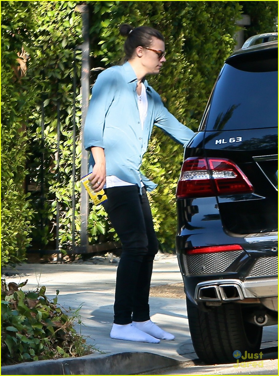 harry styles steps out before taylor swift out of woods drops 05