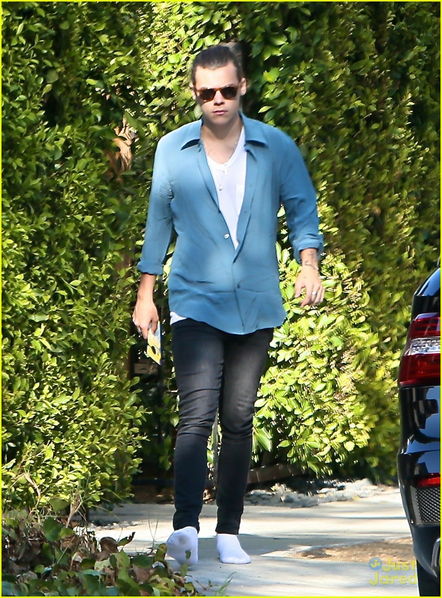 harry styles steps out before taylor swift out of woods drops 14