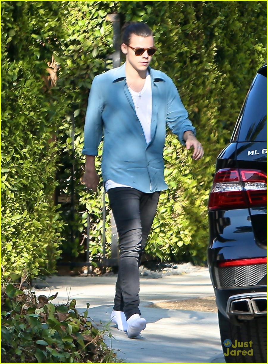 harry styles steps out before taylor swift out of woods drops 22