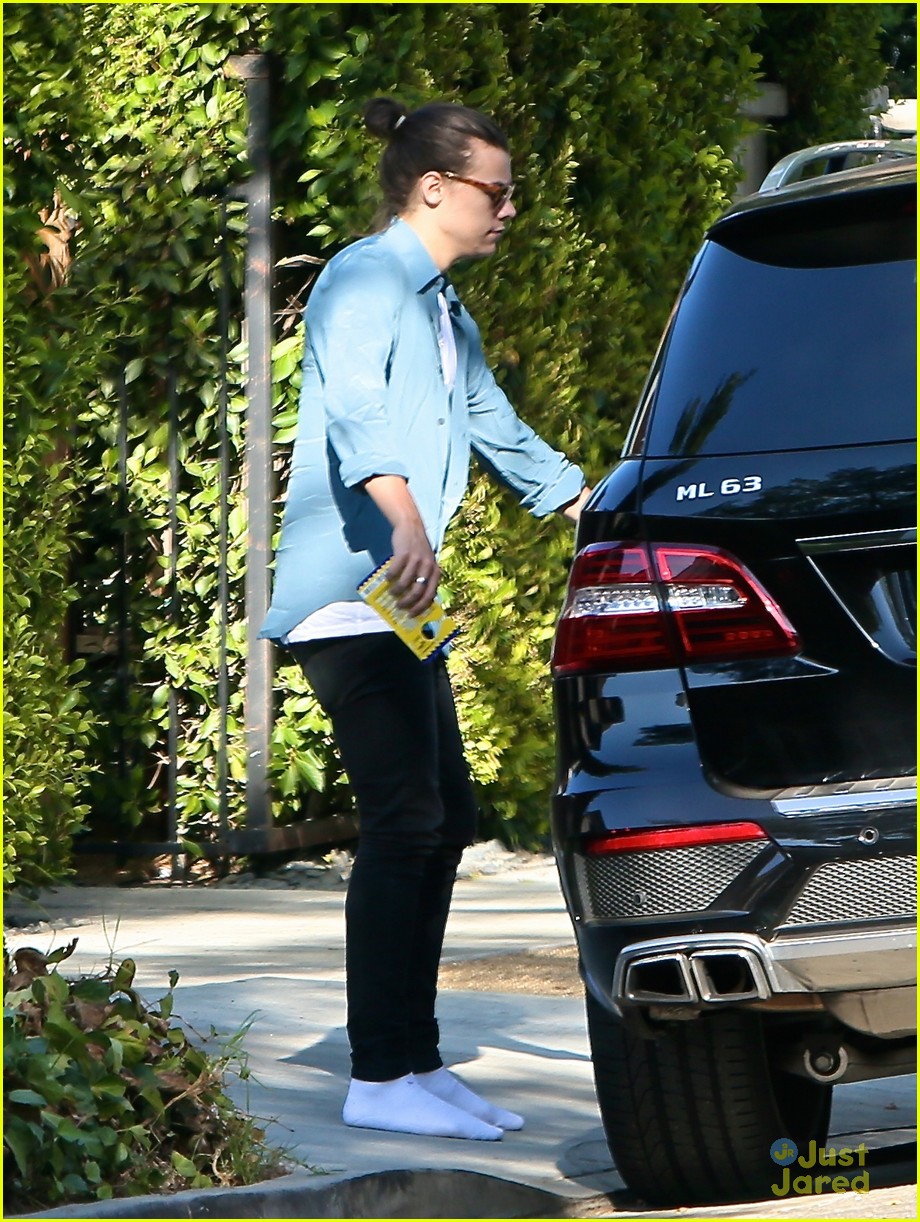 harry styles steps out before taylor swift out of woods drops 33