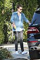 harry styles steps out before taylor swift out of woods drops 04
