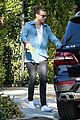 harry styles steps out before taylor swift out of woods drops 26