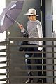 jennifer lawrence protects herself from the sun 03
