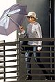 jennifer lawrence protects herself from the sun 06