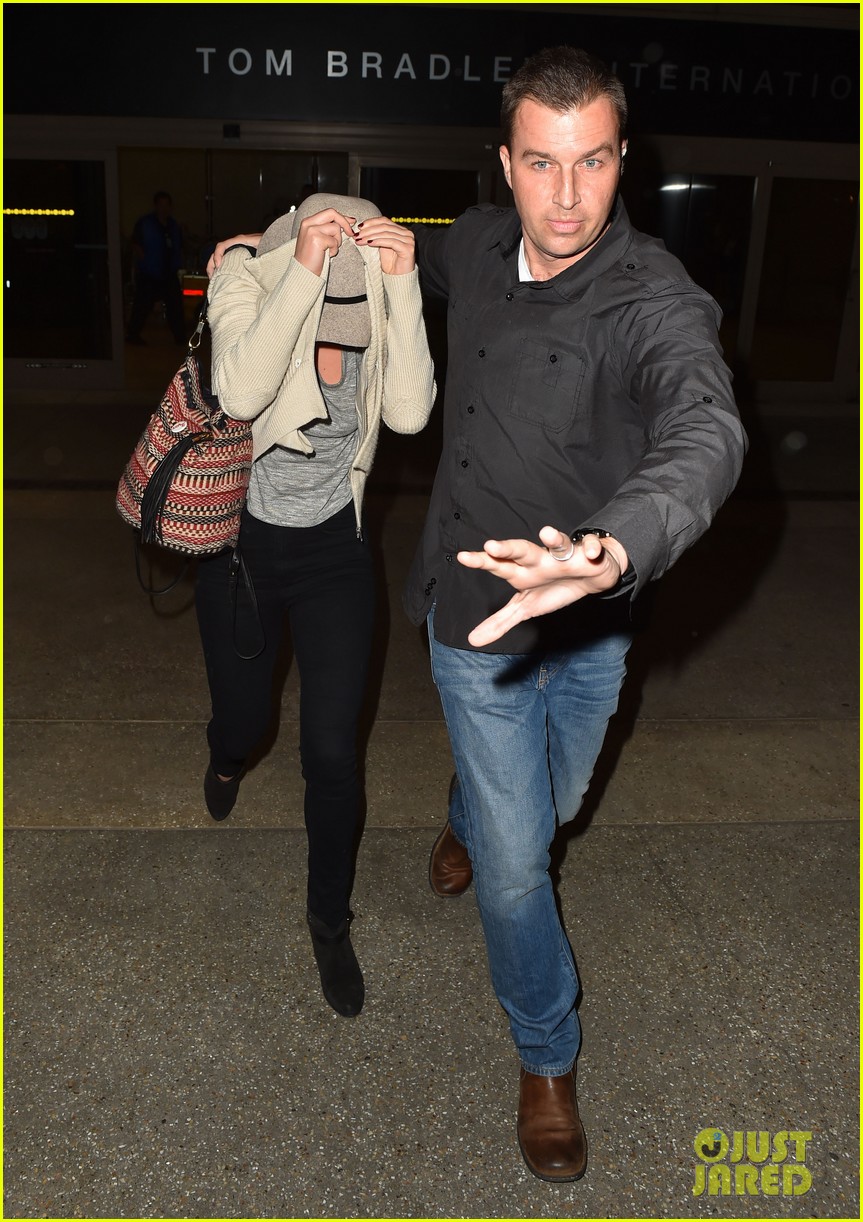 jennifer lawrence touches down at lax after serena 11