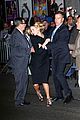 jennifer lawrence rushes to safety after fans knock down barrier 03