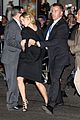 jennifer lawrence rushes to safety after fans knock down barrier 07