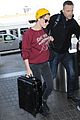 kristen stewart jets out of lax airport 01