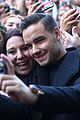 liam payne defends his fake smiles while taking selfies 02