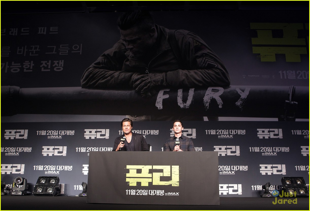 brad pitt logan lerman take the stage for fury in seoul 06