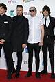 one direction guys pull off sleek red carpet fashion at aria awards 04