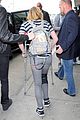chloe moretz knee brace crutches lax arrival 17