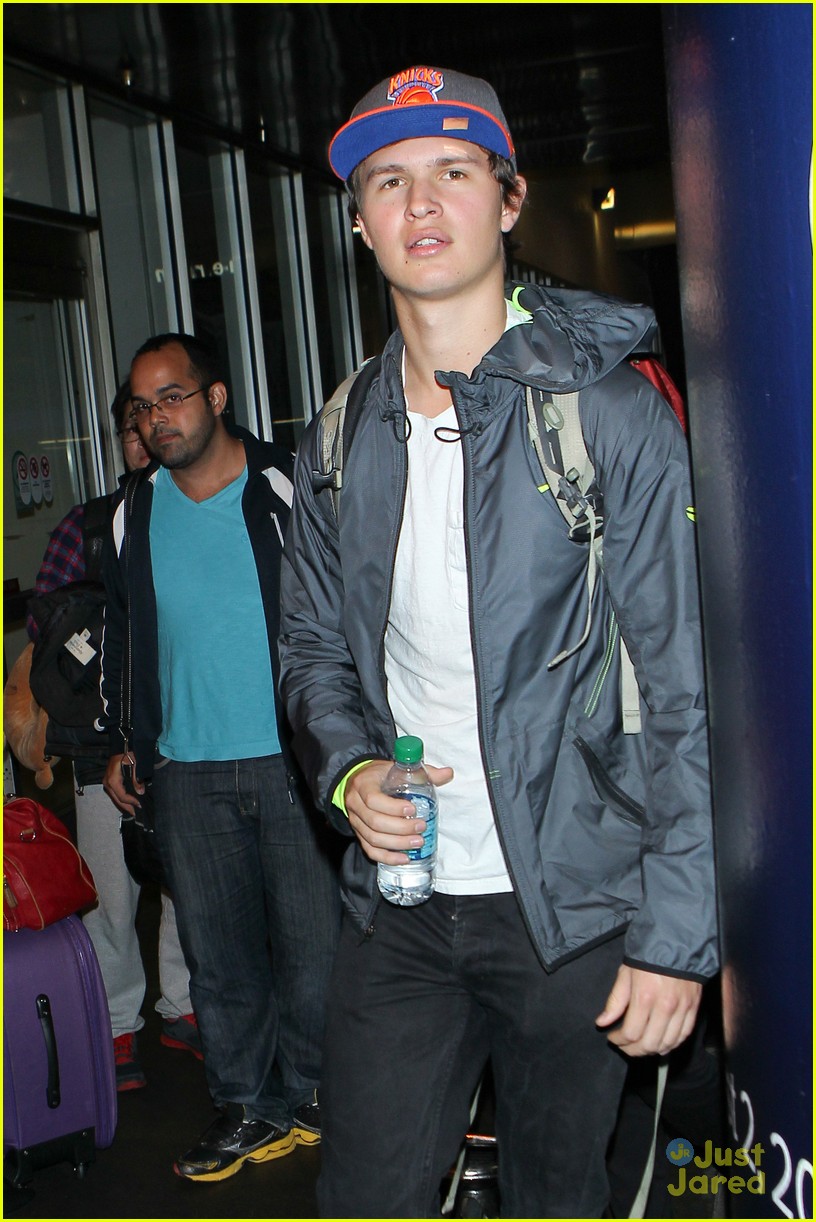 ansel elgort poses with fans airport 03