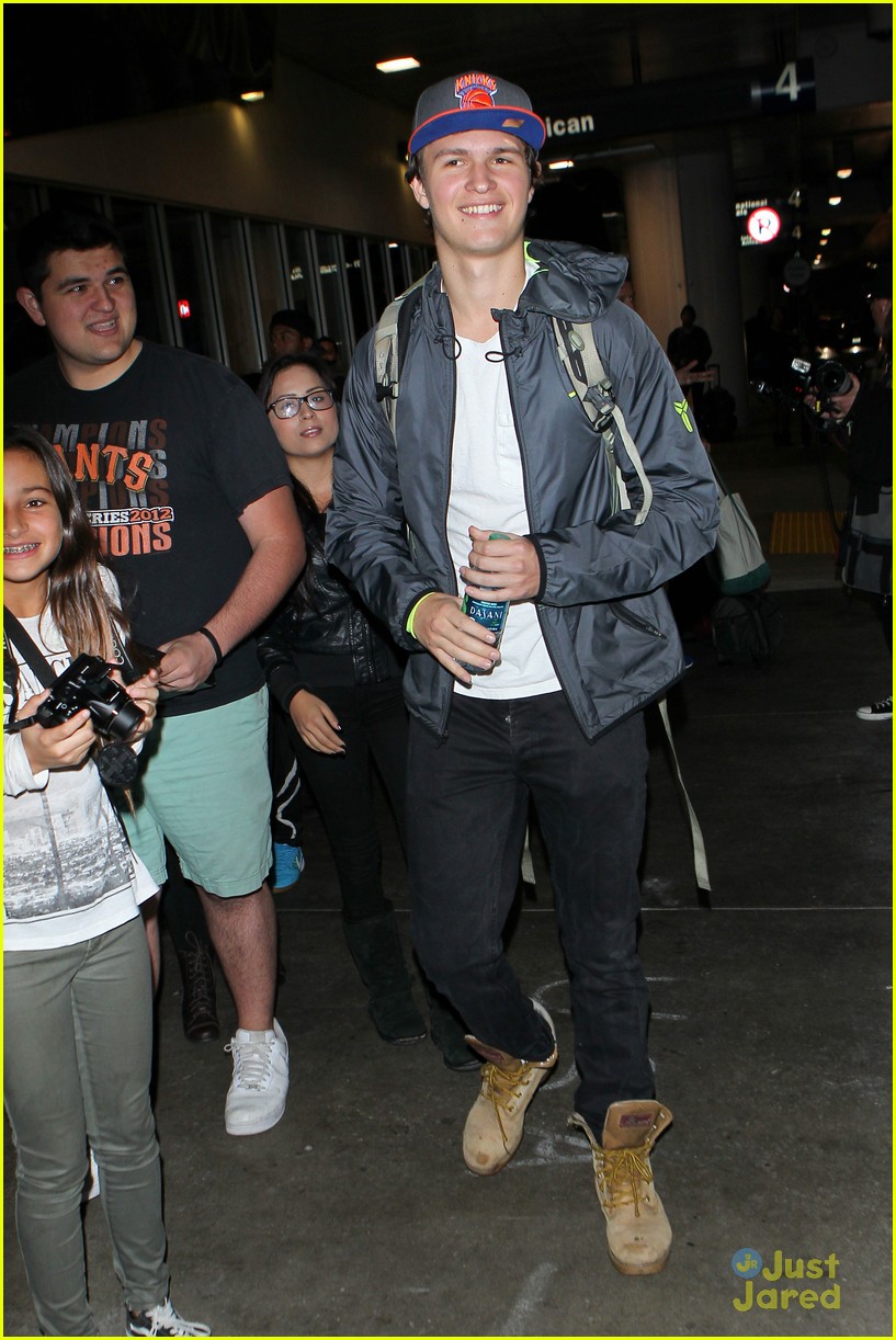 ansel elgort poses with fans airport 04