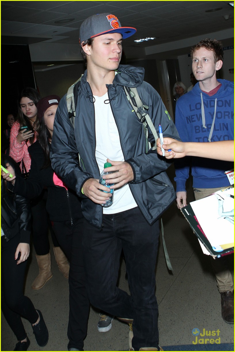 ansel elgort poses with fans airport 15