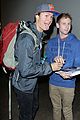 ansel elgort poses with fans airport 01