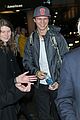 ansel elgort poses with fans airport 07