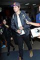 ansel elgort poses with fans airport 14