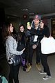 ansel elgort poses with fans airport 16